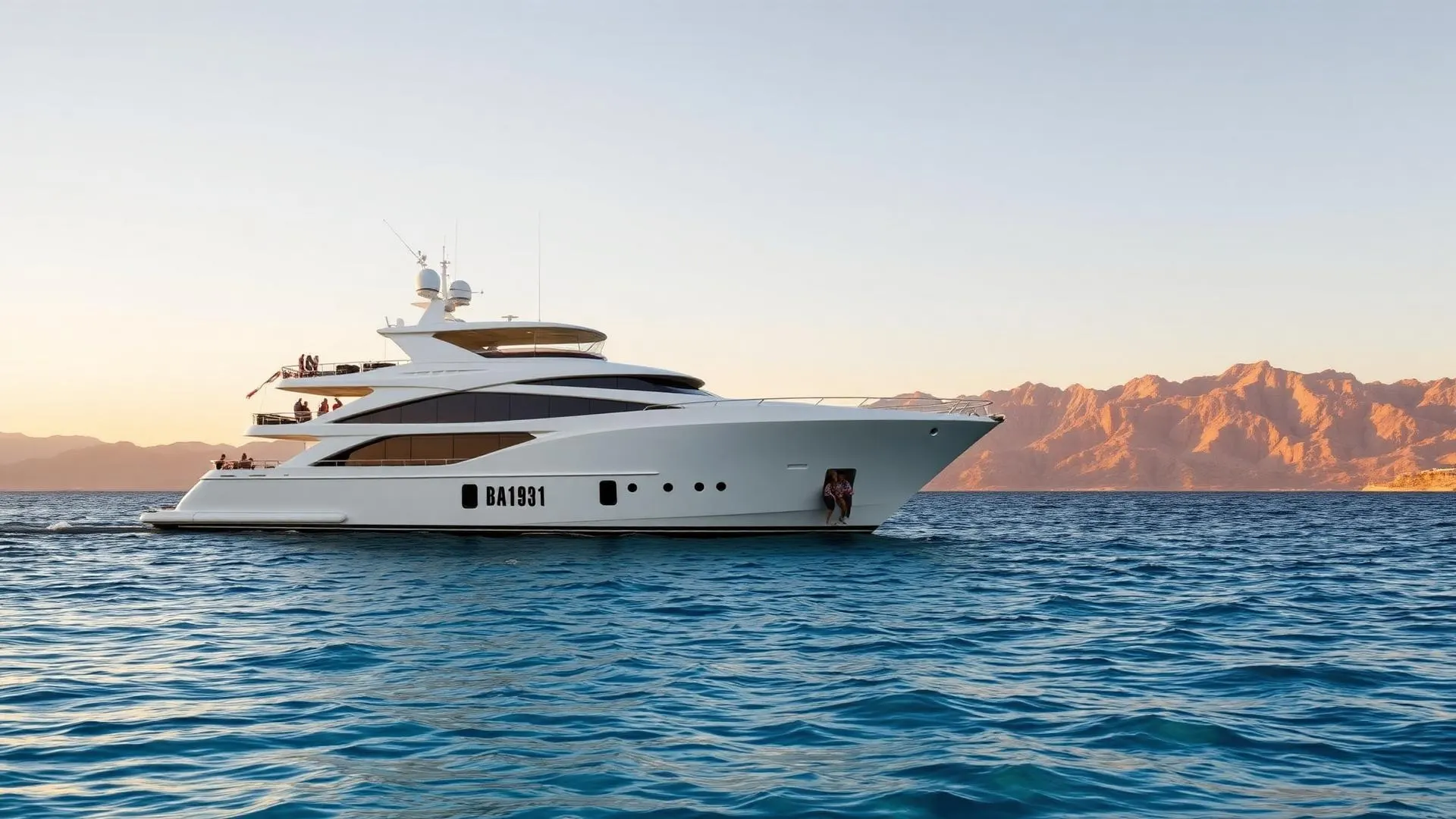 Luxury yacht anchored in crystal clear Red Sea water